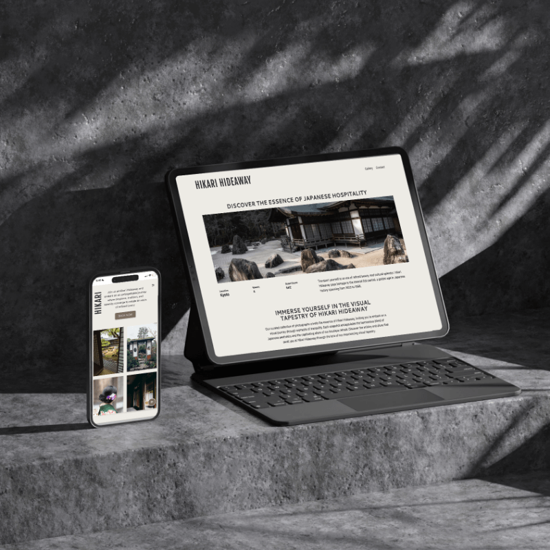 Laptop and phone displaying the Hikari Hideaway website design.