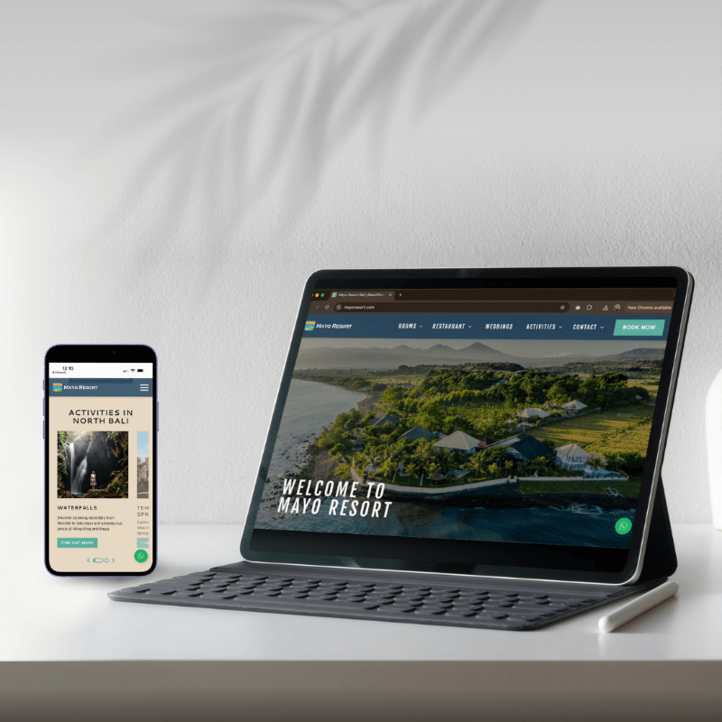 Laptop and tablet showcasing the Mayo Resort website design.
